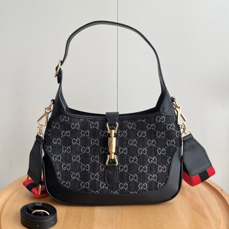 G*u*i top handle bags